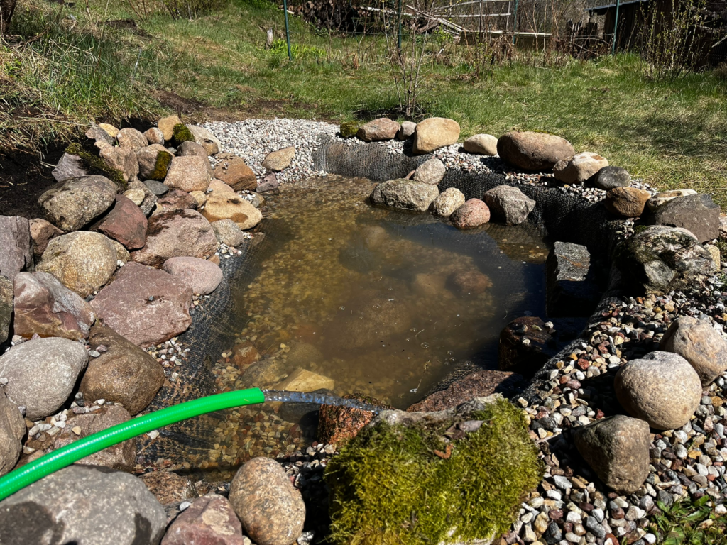 Filling the pond with water